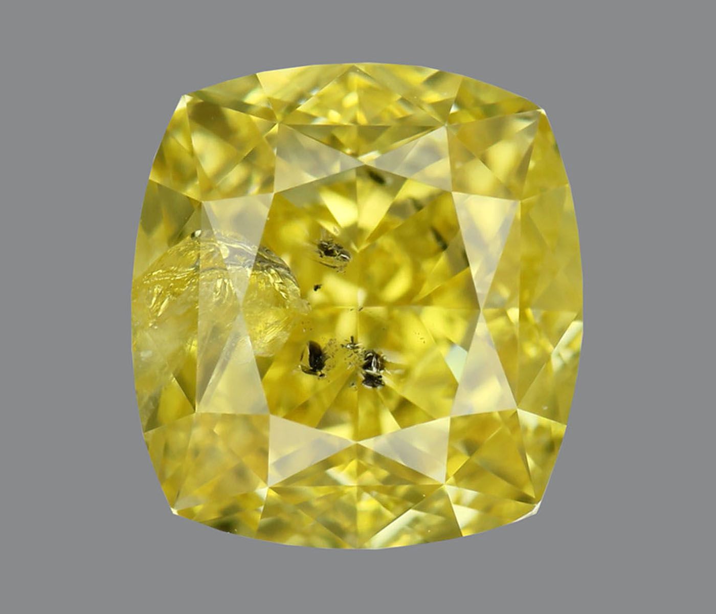 1.5-carat cushion diamond with null color, Good cut, and I2 clarity.