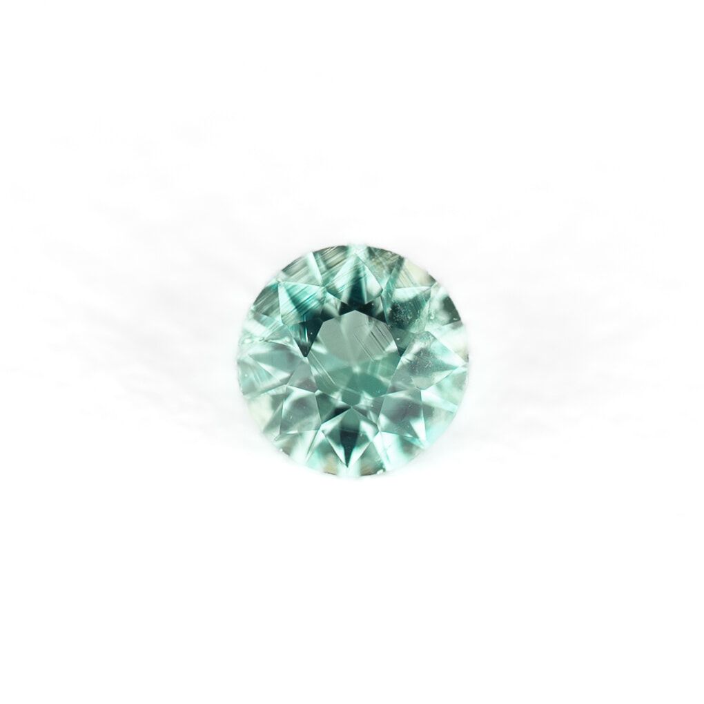 0.11ct ROUND EMERALD