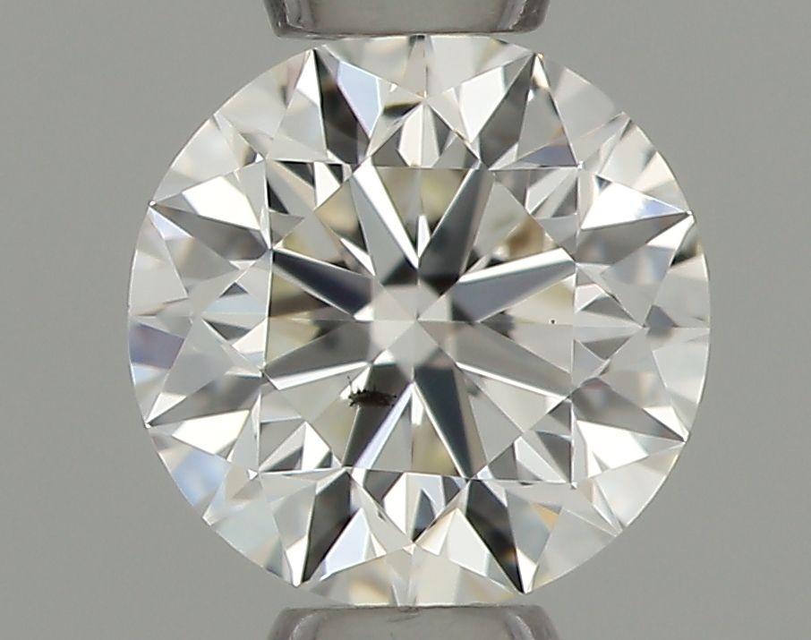 0.31-carat round diamond with J color, Very Good cut, and SI1 clarity.