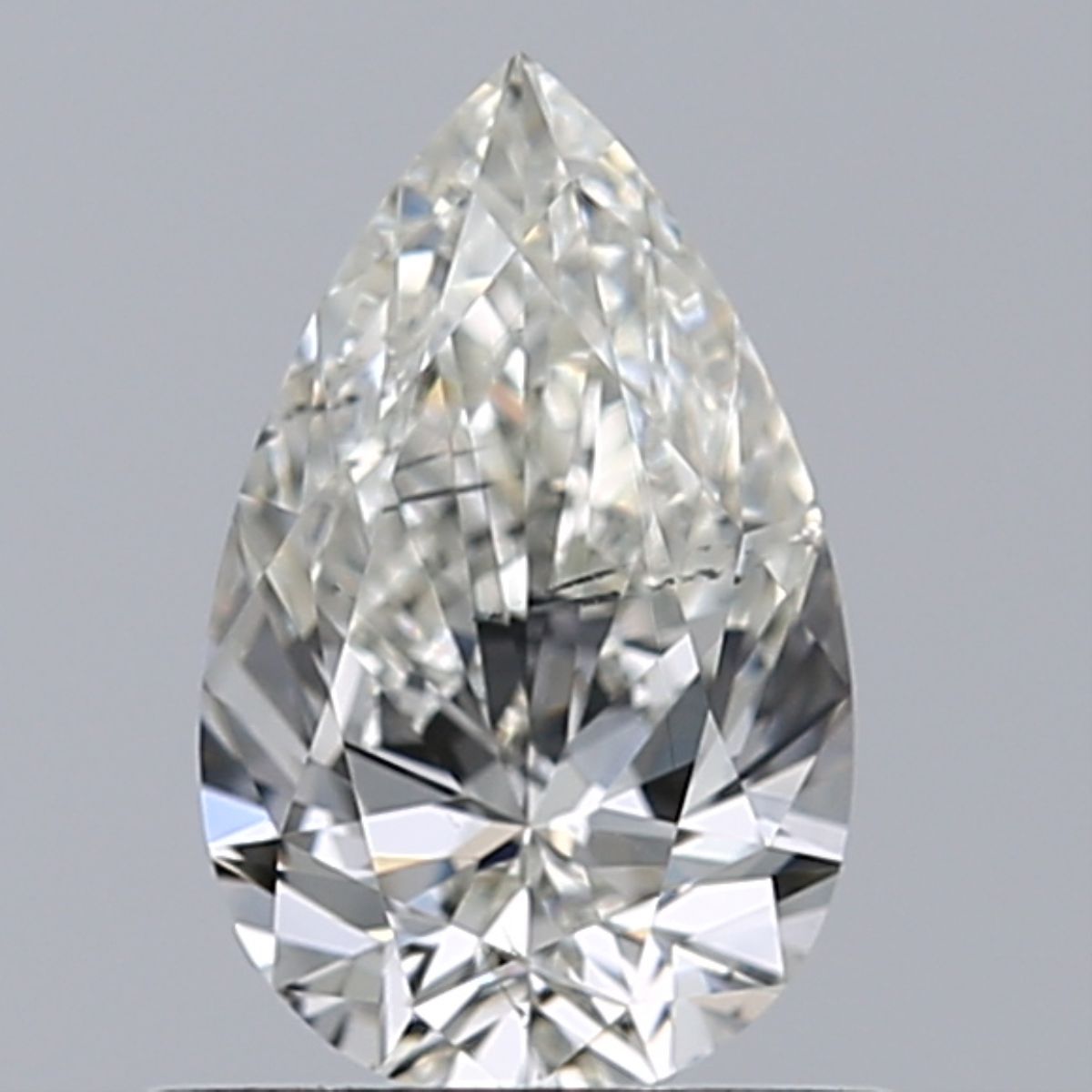 0.57-carat pear diamond with I color, Good cut, and SI2 clarity.
