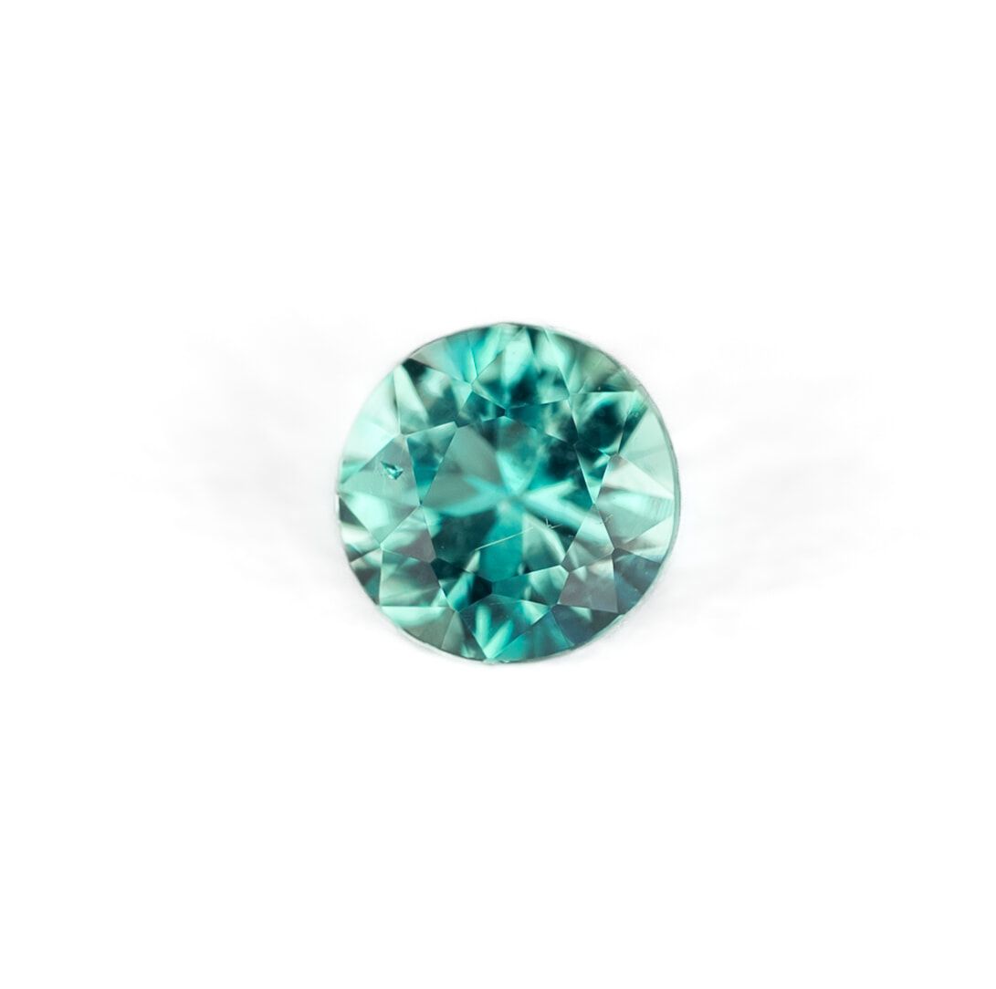 0.16ct ROUND EMERALD