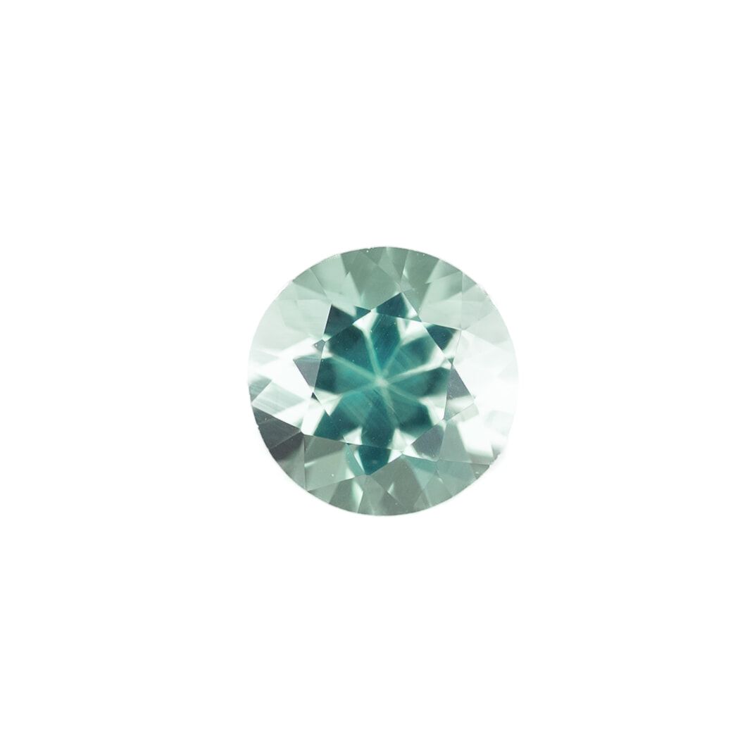 0.16ct ROUND EMERALD